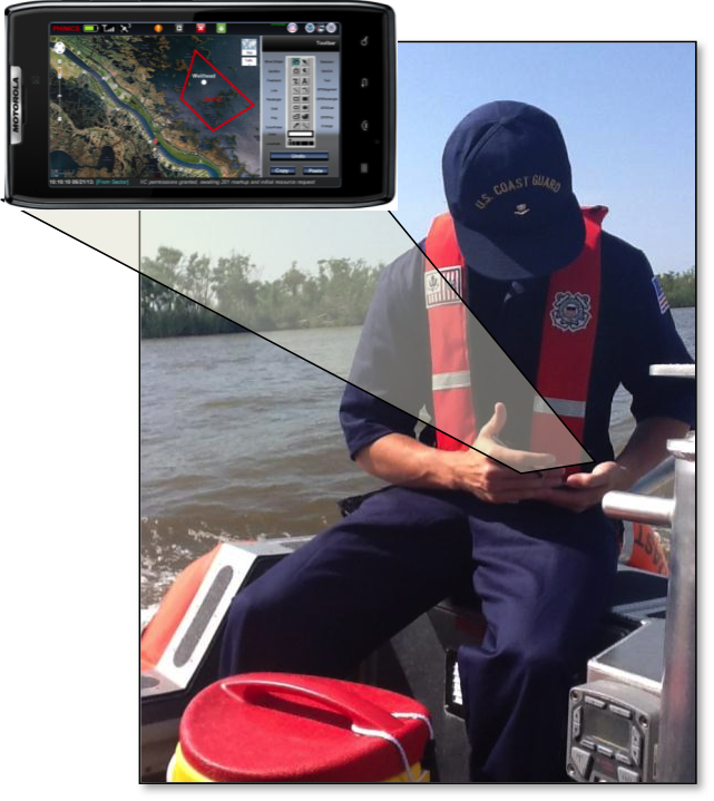 A U.S. Coast Guard responder located offshore uses a smartphone. 