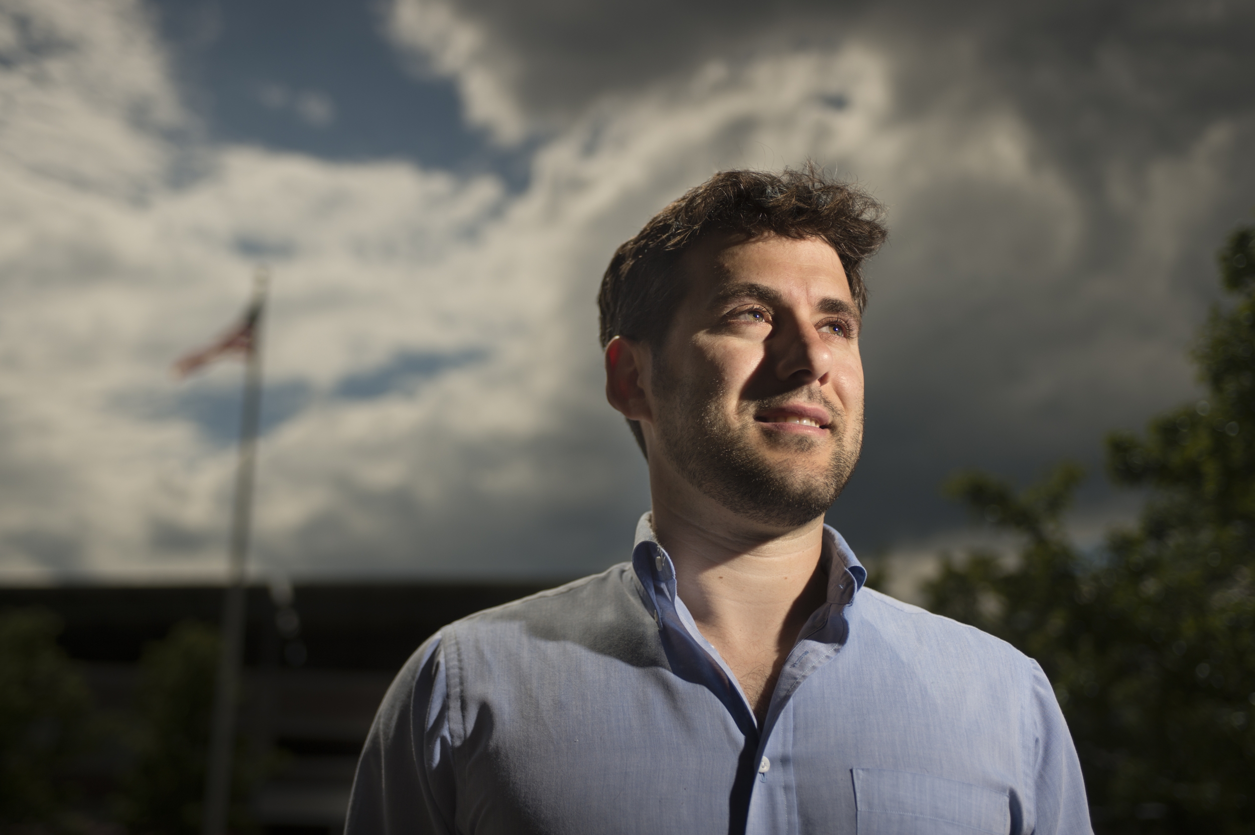 A portrait photograph of Andrew Mack. 