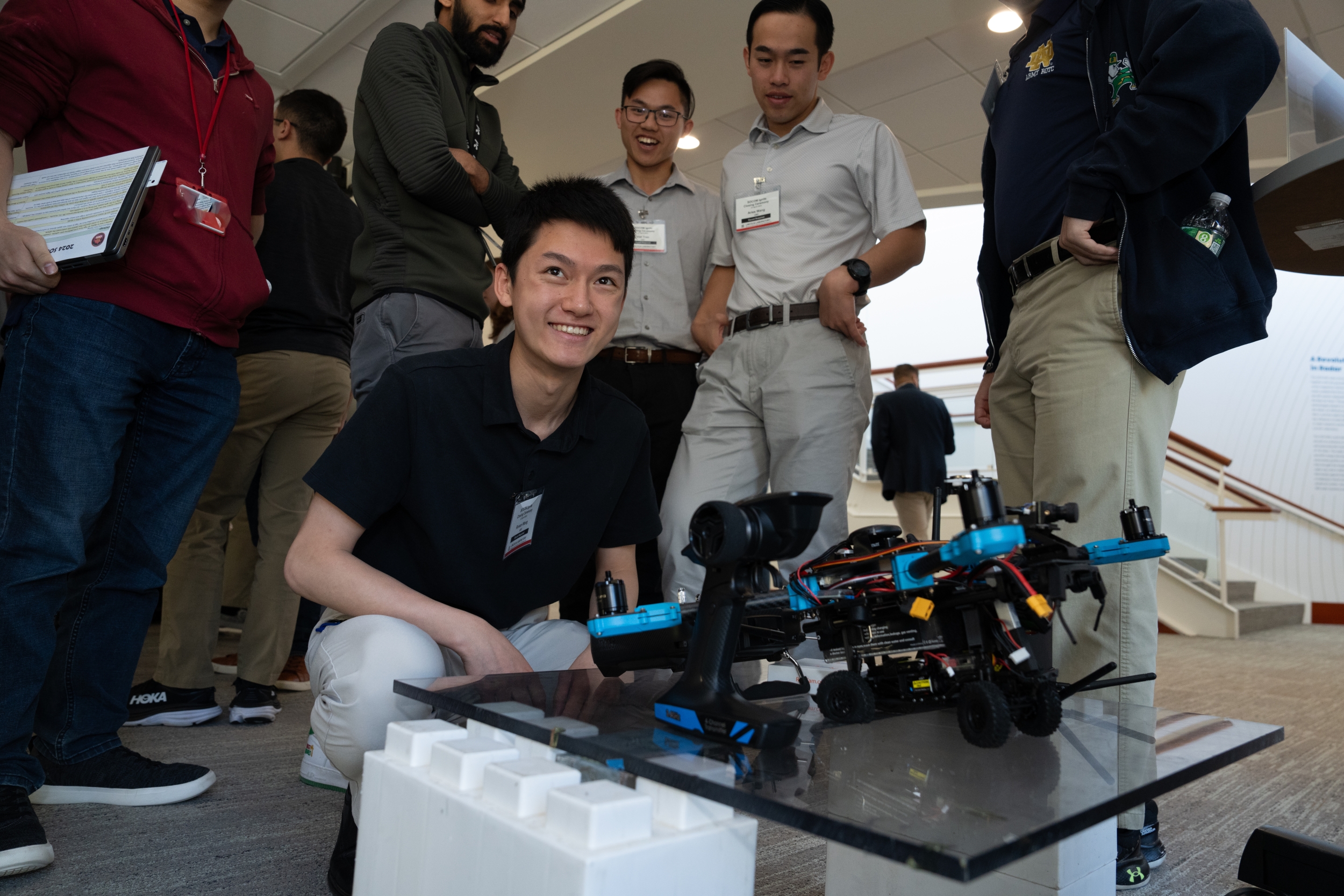 A cadet shows off a drone he and his fellow teammates developed.