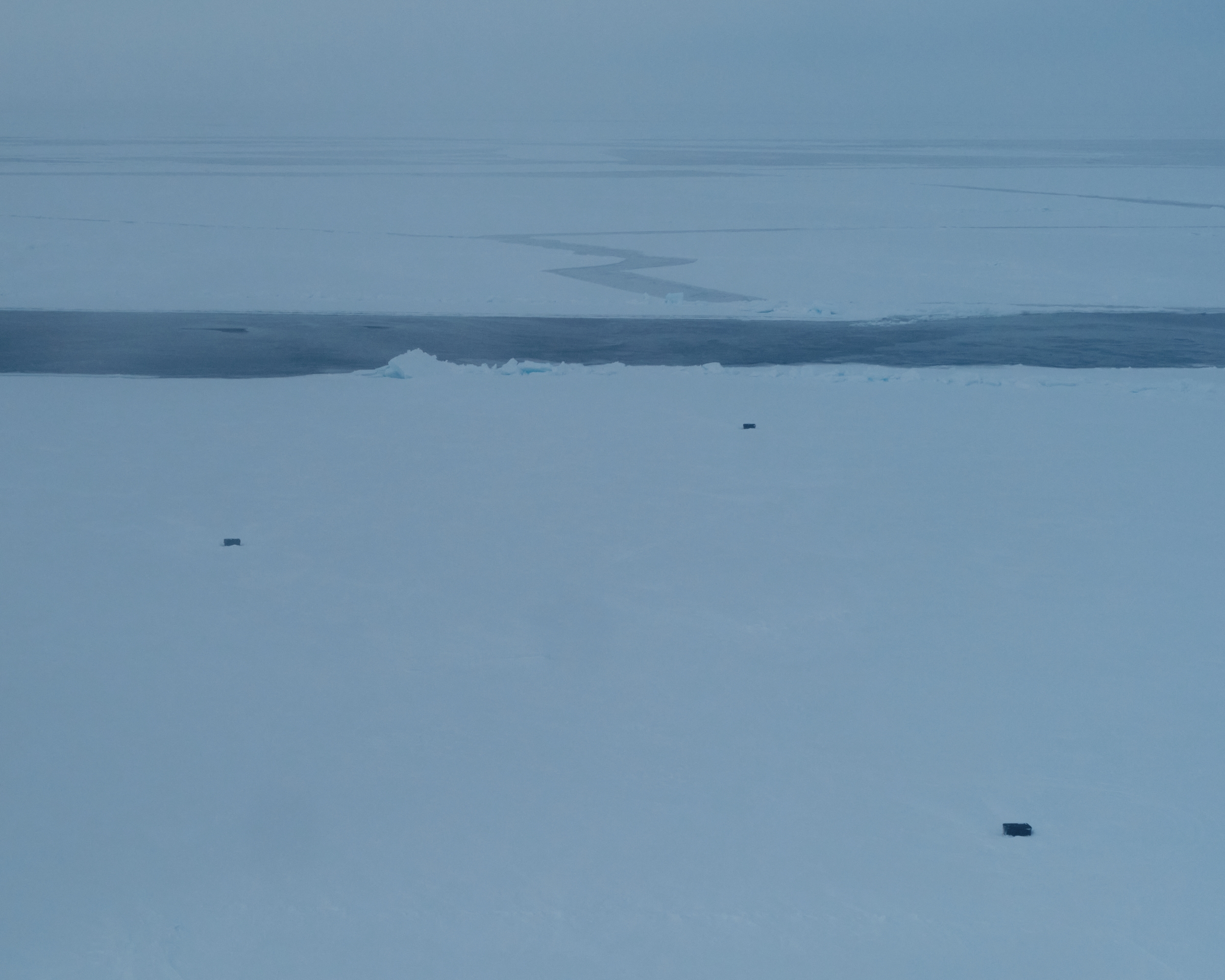 A photo of a 150-meter-wide opening in Arctic sea ice. 