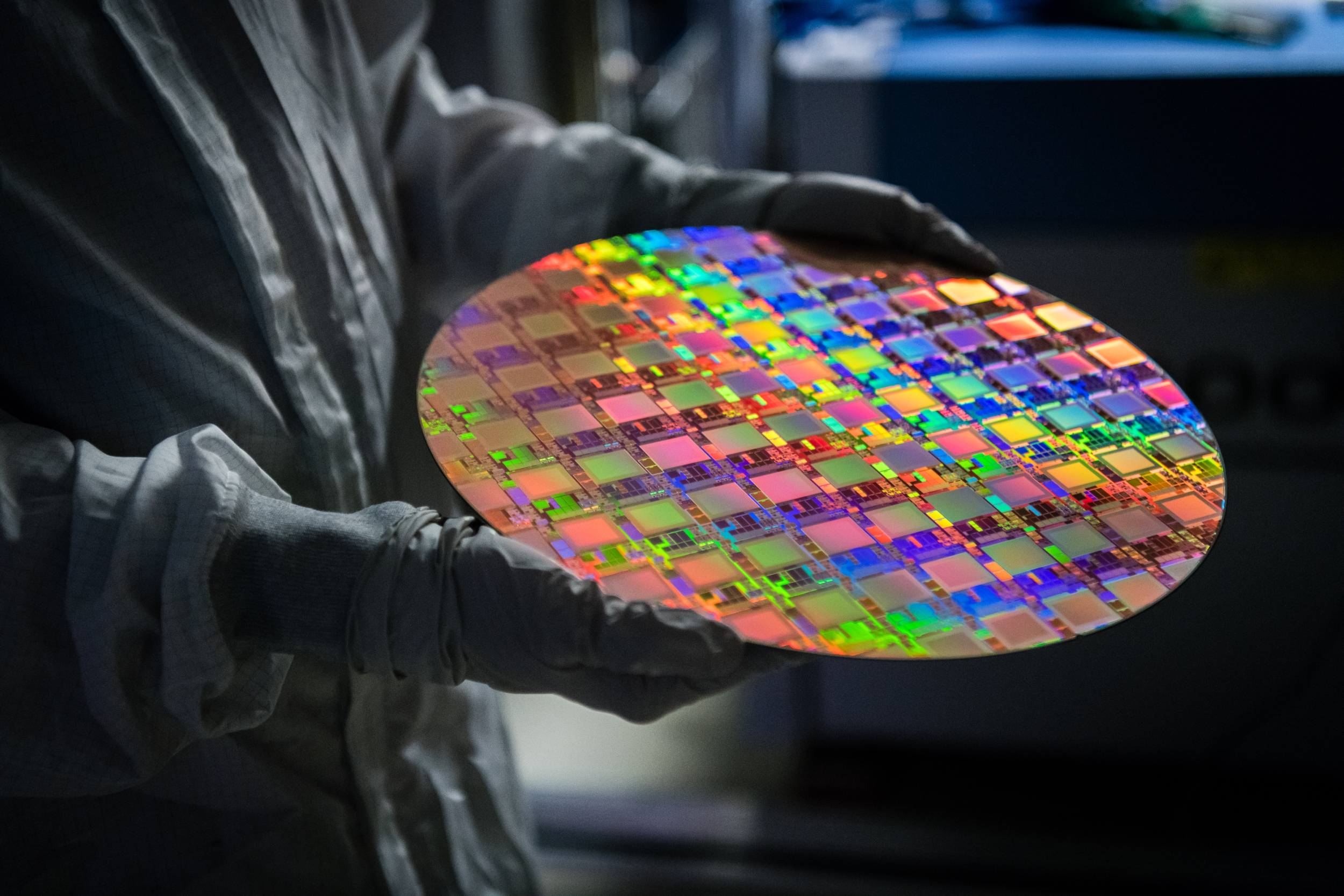 A brightly colored integrated circuit board containing six billion transitors.