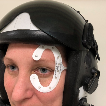 Photo of a person wearing the eye-tracking electrode and helmet